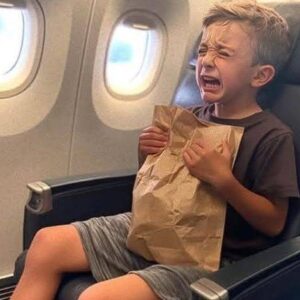 In the Airplane Restroom, I Found a Weeping Boy Holding a Paper Bag — He Wasn’t Even on the Passenger List