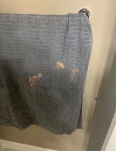 Why Those Mysterious Orange Marks Keep Showing Up on Your Towels